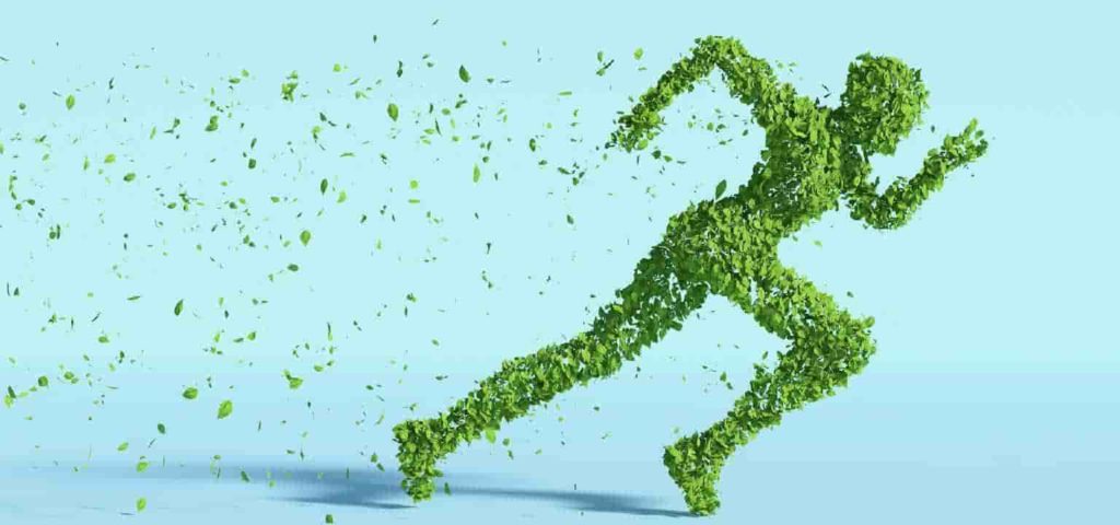 Sustainability, a grass figured person running
